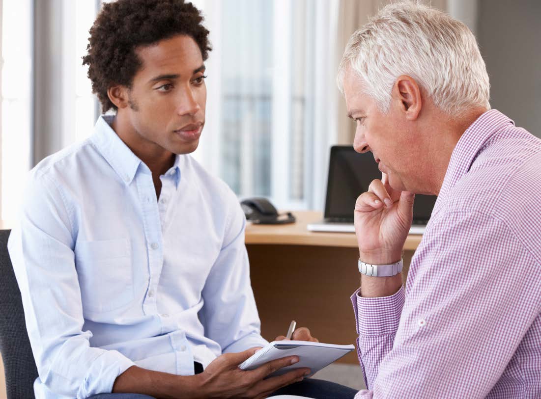 Engagement specialist listening to a patient